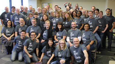 Group of High Touch employees in their new 30th Anniversary T-shirts