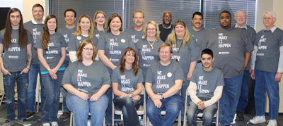 Group of High Touch employees in their new 30th Anniversary T-shirts