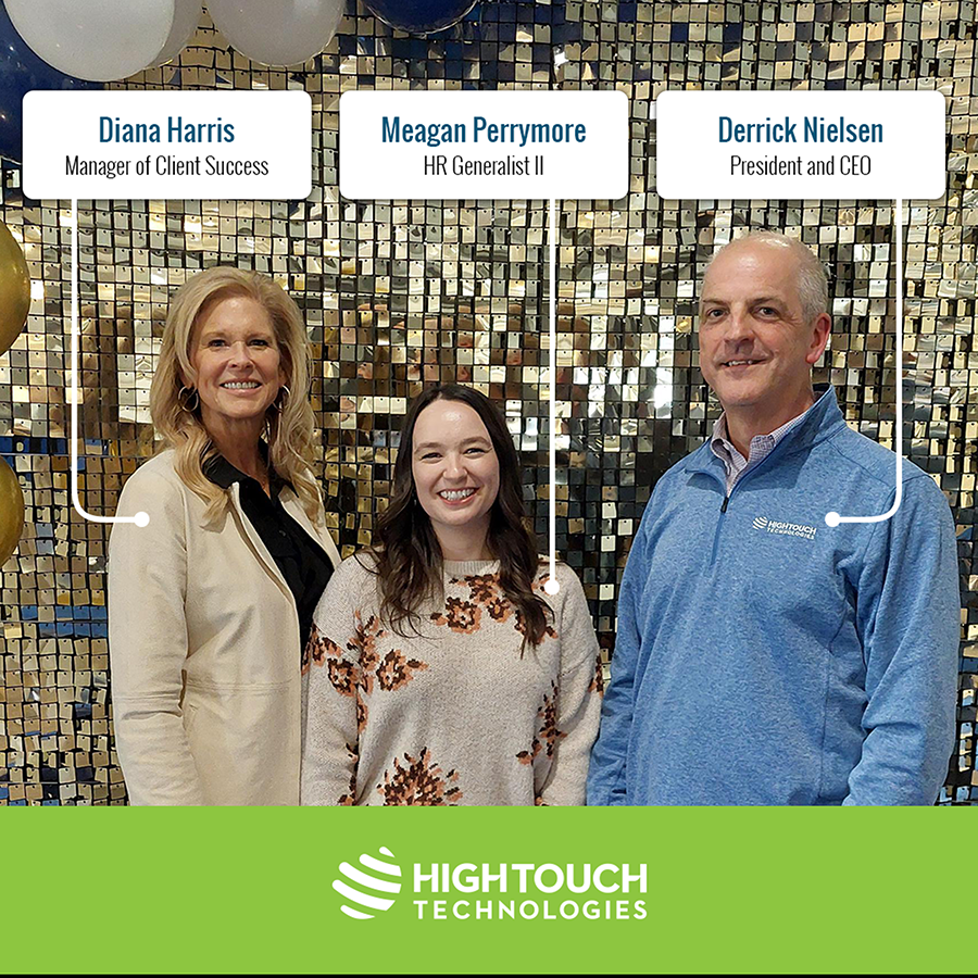 High Touch Technologies team members Diana Harris, Meagan Perrymore, and Derrick Nielsen at the Boys & Girls Clubs Youth of the Year event, standing in front of a gold sequin backdrop with balloons overhead.