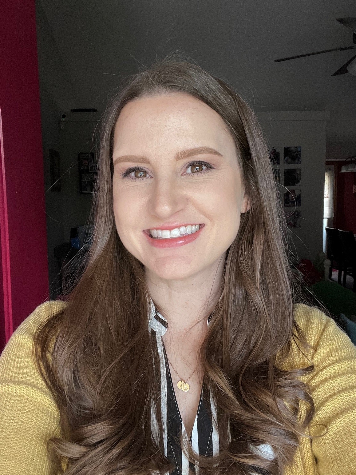 Rachel Bishop, Customer Success Manager at High Touch Technologies, wearing a yellow cardigan and smiling in a well-lit indoor setting. Her friendly and approachable demeanor reflects her dedication to building strong client relationships and making IT solutions seamless for customers.