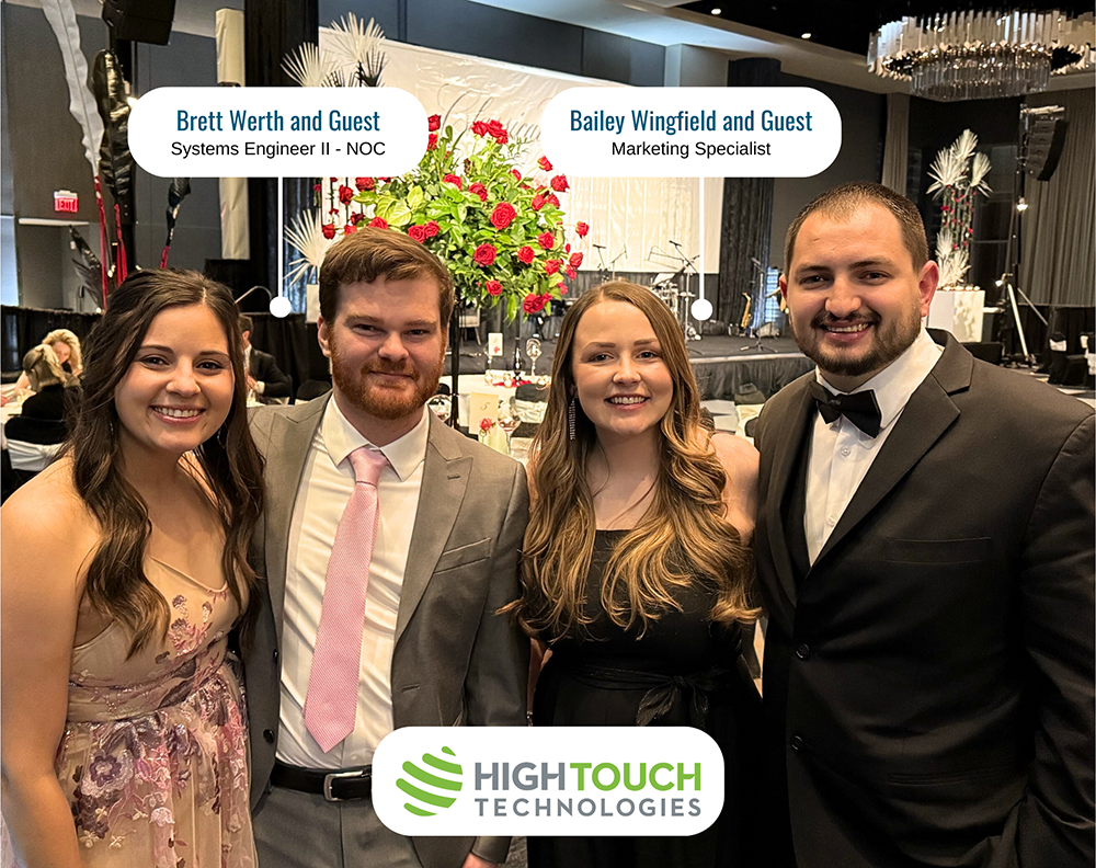 High Touch Technologies employee-owners and guests attending the 2025 Lyric Opera Ball in Kansas City, supporting the Lyric Opera of Kansas City as part of the company’s community involvement and managed IT services partnership.